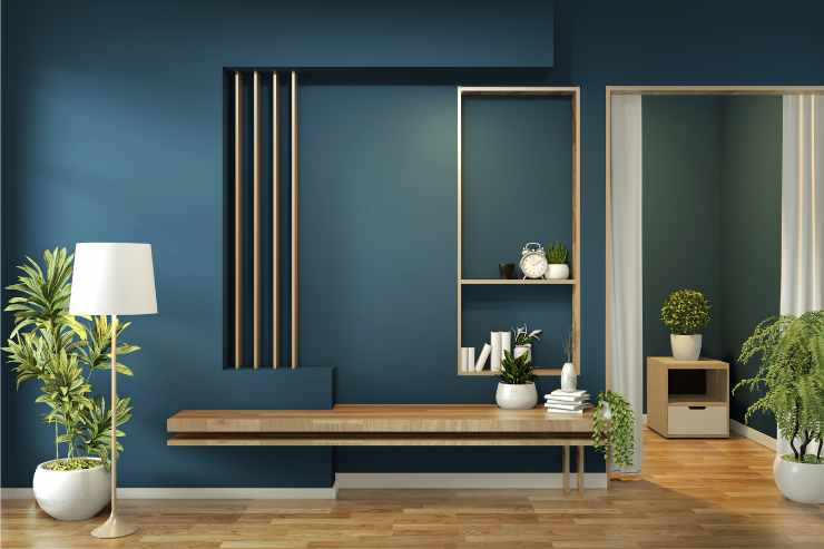 Mobili semplici in stile contemporaneo e parete blu 