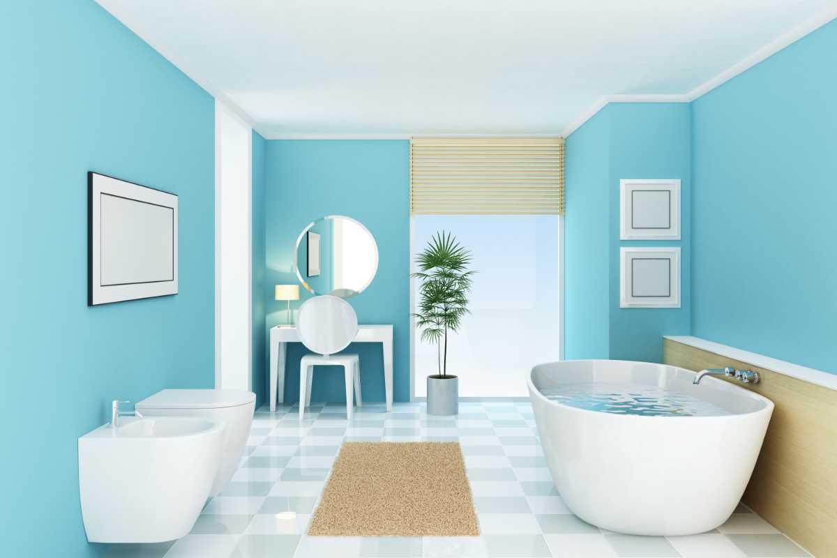 bagno con pareti dipinte di azzurro