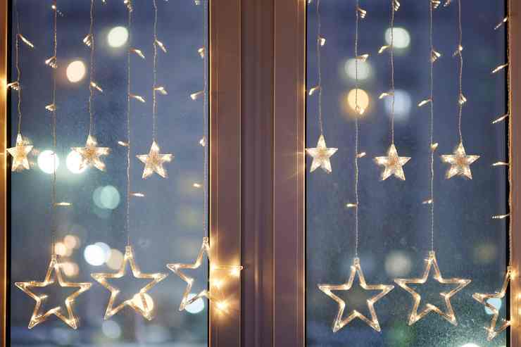 Decorazioni natalizie per finestre con luci a forma di stella