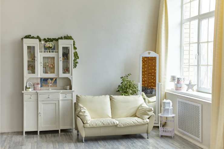Angolo soggiorno arredato in stile rustico e scandinavo 
