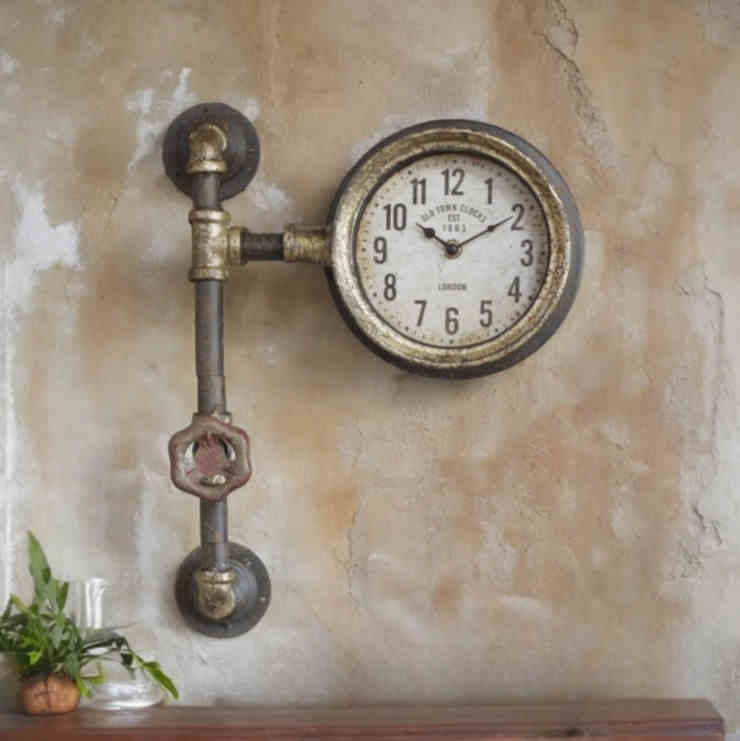 Orologio da parete in stile industriale con tubi in metallo