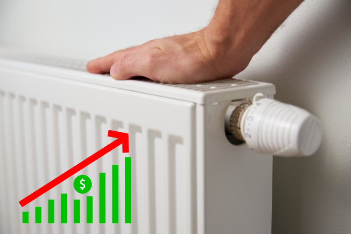 mano su termosifone e grafica di prezzi in aumento