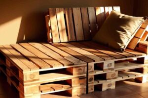 Chaise longue fai da te in pallet con cuscino sopra